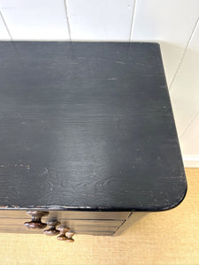 An Ebonized Antique English Chest of Drawers/Dresser