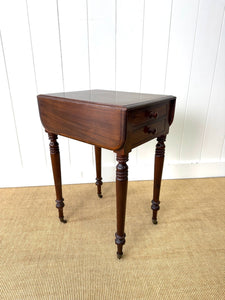 A Petite Early Victorian Mahogany Pembroke Table