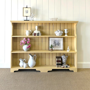 An Antique English Bookcase in Butter Yellow