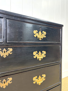 An Ebonized Antique English Chest of Drawers/Dresser