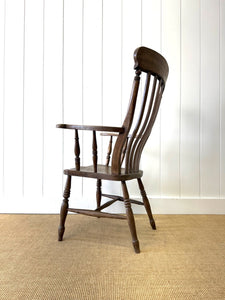 A Victorian Elm Slat Back English Windsor Farmhouse Armchair