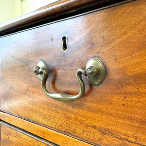 A English Georgian Chest of Drawers with Swan Neck Hardware