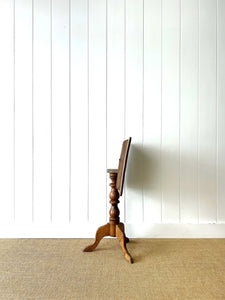 An Antique English Birch Tilt-top Table