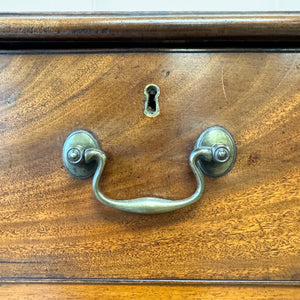 A English Georgian Chest of Drawers with Swan Neck Hardware