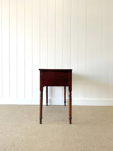 An Antique English Desk or Table with Three Drawers