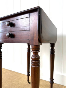 A Petite Early Victorian Mahogany Pembroke Table