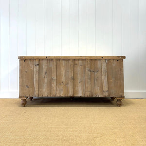 A Light Pine Antique English Sideboard on Tulip Feet c1890