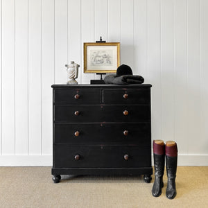 An Ebonized Antique English Chest of Drawers/Dresser