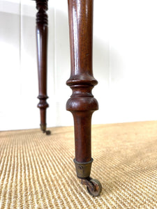 A Petite Early Victorian Mahogany Pembroke Table
