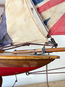 An English Antique Red Pond Yacht with Stand