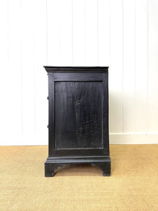An Ebonized Antique English Chest of Drawers/Dresser