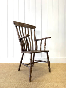 A Victorian Elm Slat Back English Windsor Farmhouse Armchair