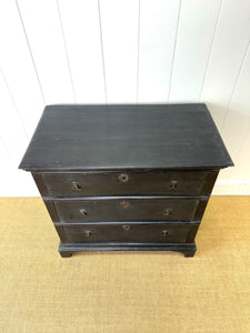 An Ebonized Antique English Chest of Drawers/Dresser