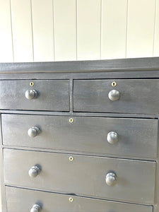 An Ebonized Antique English Chest of Drawers/Dresser