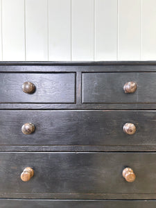 An Ebonized Antique English Chest of Drawers/Dresser