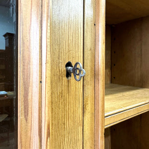 A 19th Century English Pine Bookcase Cabinet or Hutch with Arched Doors