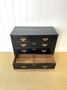 An Ebonized Antique English Chest of Drawers/Dresser