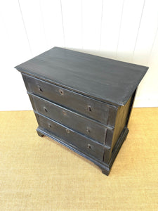 An Ebonized Antique English Chest of Drawers/Dresser