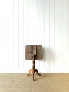 An Antique English Birch Tilt-top Table