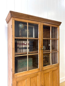 An English 19th Century Pine Bookcase with Glazed Doors