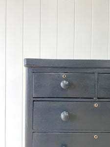 An Ebonized Antique English Chest of Drawers/Dresser