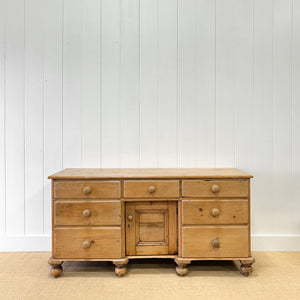 An English Country 7 Drawer Pine Buffet or Sideboard
