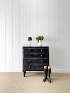 An Ebonized Antique English Chest of Drawers/Dresser