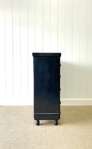 An Ebonized Antique English Chest of Drawers/Dresser
