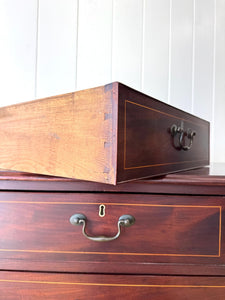 A English Georgian Mahogany Chest of Drawers with Swan Neck Hardware