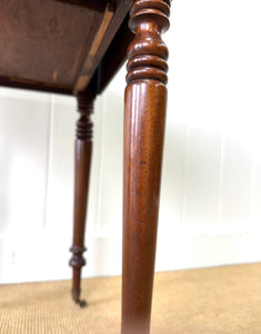 A Petite Early Victorian Mahogany Pembroke Table