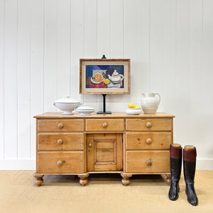 An English Country 7 Drawer Pine Buffet or Sideboard