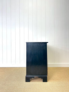 An Ebonized Antique English Chest of Drawers/Dresser