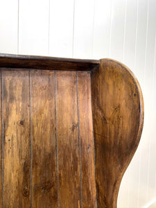 An English 19th Century Curved Bench or Settle