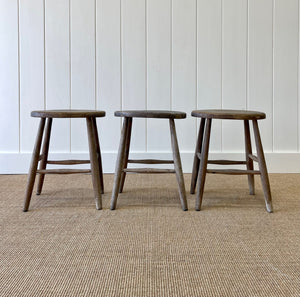 A Set of 3 Elm Splayed Leg Stools