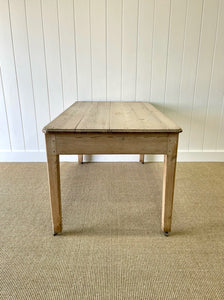 An Antique English Country Pine Dry Surface 5ft Dining Harvest Table on Castors