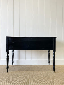 An English Pine Ebonized Console Side Table with Brass Castors c1820