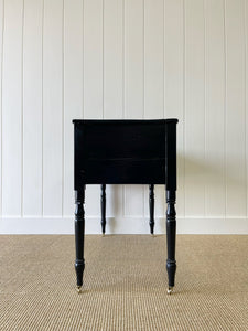 An English Pine Ebonized Console Side Table with Brass Castors c1820