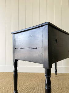 An English Pine Ebonized Console Side Table with Brass Castors c1820