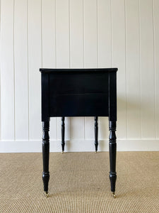 An English Pine Ebonized Console Side Table with Brass Castors c1820