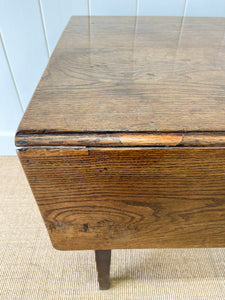 An Early English Country Oak Drop Leaf Table with Drawer c1800