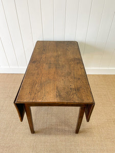 An Early English Country Oak Drop Leaf Table with Drawer c1800