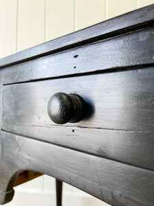 An English Pine Ebonized Console Side Table with Brass Castors c1820