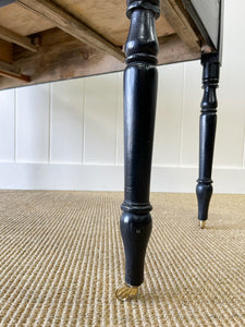 An English Pine Ebonized Console Side Table with Brass Castors c1820