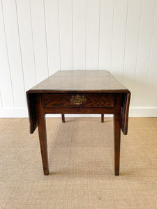 An Early English Country Oak Drop Leaf Table with Drawer c1800