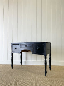 An English Pine Ebonized Console Side Table with Brass Castors c1820