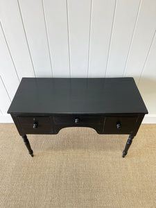 An English Pine Ebonized Console Side Table with Brass Castors c1820