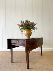 An Early English Country Oak Drop Leaf Table with Drawer c1800