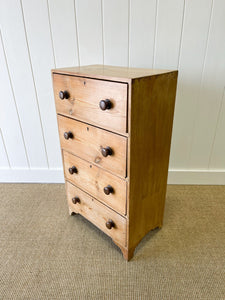 An Antique English Pine Narrow Chest of Drawers Dresser with Dark Wooden Knobs