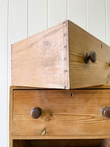 An Antique English Pine Narrow Chest of Drawers Dresser with Dark Wooden Knobs