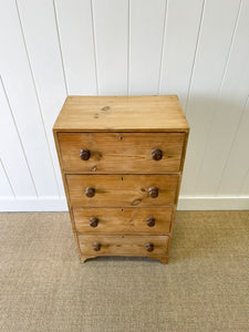 An Antique English Pine Narrow Chest of Drawers Dresser with Dark Wooden Knobs